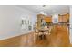 Bright kitchen and breakfast nook featuring hardwood floors and stainless appliances, perfect for everyday dining and entertaining at 3541 Wilton Ave, Atlanta, GA 30340