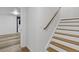 Staircase with wood treads and white risers leading to the upper level at 3541 Wilton Ave, Atlanta, GA 30340