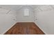 A bright walk-in closet with hardwood floors and wire shelving at 3541 Wilton Ave, Atlanta, GA 30340