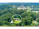 Aerial of home in wooded area near town; convenient location close to local shopping at 514 Macedonia Forest Circle Cir, Canton, GA 30115