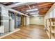 Large basement room with visible duct work, water heater and wood laminate flooring at 514 Macedonia Forest Circle Cir, Canton, GA 30115