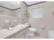 Tile bathroom with a sink, toilet, bathtub and a window at 514 Macedonia Forest Circle Cir, Canton, GA 30115