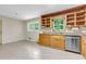 Open kitchen with a stainless steel dishwasher and granite countertop, offering an open concept space at 514 Macedonia Forest Circle Cir, Canton, GA 30115