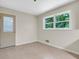 Bright, tiled room featuring a window and door to the exterior at 514 Macedonia Forest Circle Cir, Canton, GA 30115