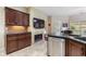Well-equipped kitchen features granite countertops and stainless steel appliances at 2905 Ivey Ridge Ln, Roswell, GA 30076