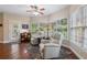 Inviting sun room with lots of windows and natural light at 2905 Ivey Ridge Ln, Roswell, GA 30076