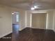 Living room featuring wood floors, ceiling fan and a sliding door to the outside at 303 Tara Commons Cir, Loganville, GA 30052
