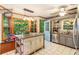 Bright kitchen featuring an island, stainless steel appliances, and a cozy breakfast nook at 3861 Riding Sw Trl, Powder Springs, GA 30127