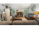 Comfortable living room featuring fireplace and hardwood floors at 3861 Riding Sw Trl, Powder Springs, GA 30127