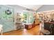 Bright living room with hardwood floors, vaulted ceilings, and stylish decor at 3861 Riding Sw Trl, Powder Springs, GA 30127