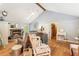 Spacious living room with fireplace, hardwood floors, and vaulted ceiling at 3861 Riding Sw Trl, Powder Springs, GA 30127