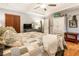 Spacious main bedroom with hardwood floors, neutral colors, and ample closet space at 3861 Riding Sw Trl, Powder Springs, GA 30127