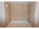 Neat bathroom featuring a tile shower and bathtub, perfect for a clean and relaxing experience at 400 17Th Nw St # 2412, Atlanta, GA 30363
