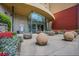 Inviting building entrance featuring stone accents, modern glass doors, and colorful landscaping at 400 17Th Nw St # 2412, Atlanta, GA 30363