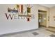 Clean and welcoming business entrance featuring decorative art, sliding doors, and clear signage at 400 17Th Nw St # 2412, Atlanta, GA 30363