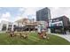 Outdoor seating area near shops and restaurants at Atlantic Station at 400 17Th Nw St # 2412, Atlanta, GA 30363