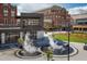 A modern building with outdoor seating and a decorative fountain at 400 17Th Nw St # 2412, Atlanta, GA 30363