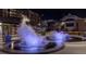 Decorative fountain at night with colored lights at 400 17Th Nw St # 2412, Atlanta, GA 30363