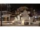 Buildings surrounding a decorative fountain at night at 400 17Th Nw St # 2412, Atlanta, GA 30363