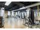 A large gym provides space for a variety of equipment including weights and weight machines at 400 17Th Nw St # 2412, Atlanta, GA 30363