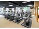 Well-equipped gym featuring treadmills, elliptical machines, and natural lighting at 400 17Th Nw St # 2412, Atlanta, GA 30363