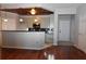 Open concept kitchen features sleek appliances, a breakfast bar and hardwood floors at 400 17Th Nw St # 2412, Atlanta, GA 30363