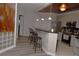 Kitchen has light colored cabinets, stainless steel appliances, and bar stool seating at 400 17Th Nw St # 2412, Atlanta, GA 30363