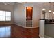 Featuring hardwood floors, the living room is spacious and bright from the large window at 400 17Th Nw St # 2412, Atlanta, GA 30363