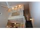 Second story view with glass block accent wall and a fan with integrated lighting at 400 17Th Nw St # 2412, Atlanta, GA 30363