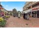 Shopping center featuring diverse stores and restaurants with a pedestrian walkway at 400 17Th Nw St # 2412, Atlanta, GA 30363