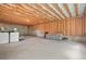 Spacious unfinished basement with exposed ceiling, concrete floor, and utility hookups at 4110 Morgan Elizabeth Way, Cumming, GA 30041
