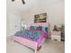 Bedroom with plush carpet, ceiling fan, pink bed frame and matching night stand at 4110 Morgan Elizabeth Way, Cumming, GA 30041