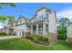 Beautiful two-story home with a well-maintained lawn and manicured landscaping at 4110 Morgan Elizabeth Way, Cumming, GA 30041
