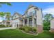 Beautiful two-story home with a well-maintained lawn and manicured landscaping at 4110 Morgan Elizabeth Way, Cumming, GA 30041