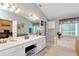 Bright bathroom with double vanity, soaking tub, and soft color palette, creating a spa-like retreat at 914 Wenham Ln, Lawrenceville, GA 30044