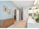Light-filled bathroom with double sinks, tile flooring, and separate shower, offering comfort and functionality at 914 Wenham Ln, Lawrenceville, GA 30044