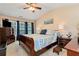Cozy bedroom featuring a vaulted ceiling, warm lighting, and comfortable furnishings for a relaxing retreat at 914 Wenham Ln, Lawrenceville, GA 30044