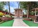 Backyard shed with brick border adding charm and functionality to the property at 914 Wenham Ln, Lawrenceville, GA 30044