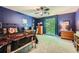 Bedroom featuring a whimsical ceiling fan, a bed, and a bright window at 110 Boulder Dr, Roswell, GA 30075