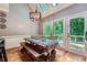 Charming breakfast nook area, bathed in natural light, is ideal for casual dining and morning coffee at 110 Boulder Dr, Roswell, GA 30075