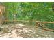 Relax on this spacious deck, with a peaceful and private wooded view at 110 Boulder Dr, Roswell, GA 30075
