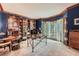 Home office featuring custom built-ins, a large desk, and a window with natural light at 110 Boulder Dr, Roswell, GA 30075