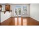 Bright dining area with hardwood floors, large windows and access to the backyard at 1935 Cobblestone Ne Cir, Brookhaven, GA 30319