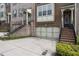 Charming townhomes with brick facade, attached garages, and inviting staircases at 1935 Cobblestone Ne Cir, Brookhaven, GA 30319