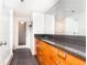 Modern bathroom with a large mirror, sleek wood vanity, granite countertop and glass-enclosed shower at 199 14Th Ne St # 412, Atlanta, GA 30309