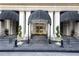 Mayfair Tower entrance featuring a covered entry and elegant stone steps at 199 14Th Ne St # 412, Atlanta, GA 30309