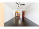 Living room with hardwood floors and a conveniently located murphy bed and kitchen at 199 14Th Ne St # 412, Atlanta, GA 30309