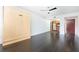 Living room with hardwood floors and a conveniently located murphy bed and kitchen at 199 14Th Ne St # 412, Atlanta, GA 30309
