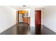 Bright living space featuring hardwood floors and an open concept kitchen with stainless steel appliances at 199 14Th Ne St # 412, Atlanta, GA 30309