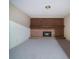 Basement fireplace with brick surround and wooden mantle at 2202 Lattimore Farm Nw Dr, Kennesaw, GA 30152